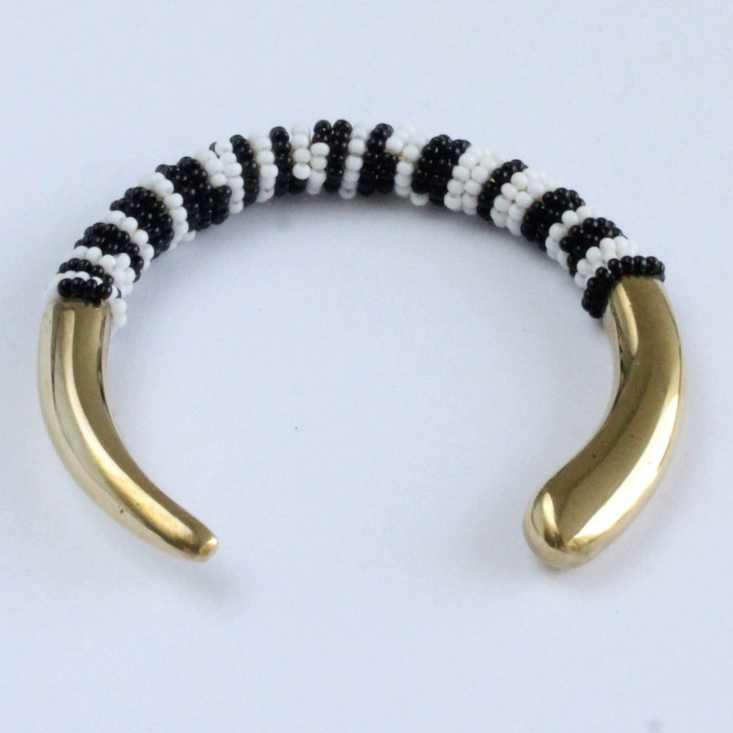 African handmade brass bracelet with black and white beads