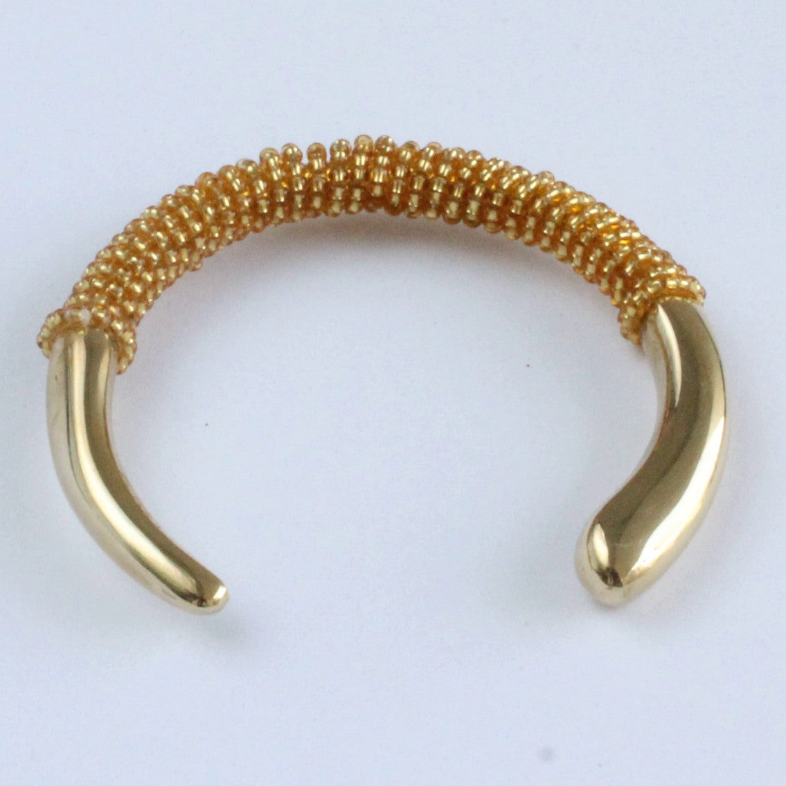 African handmade brass bracelet with gold beads