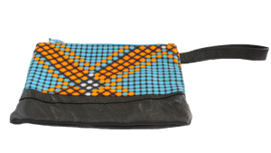Handmade wristlet with coin purse, recycled, upcycled leather, African print, Kitenge fashion, Ankara fashion, wallet, travel wallet, right
