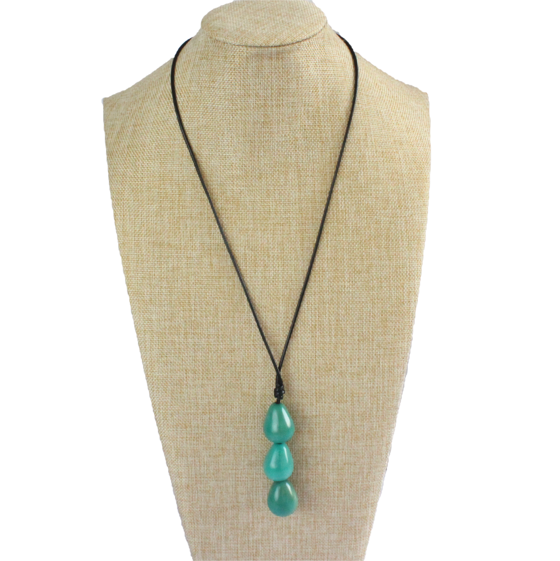 Necklace, handmade, sustainable tagua nut, turquoise, stand