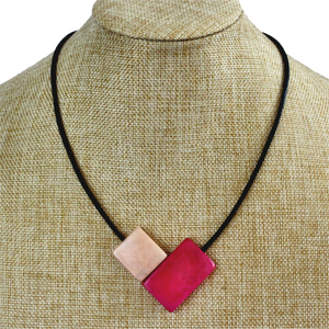 Handmade necklace, sustainable, tagua nut, magnetic lock, pink, stand